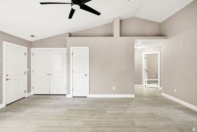 778 South 650 West Logan, UT 84321 - Photo 8 of 26 Spacious room featuring vaulted ceilings, wood-finish flooring.