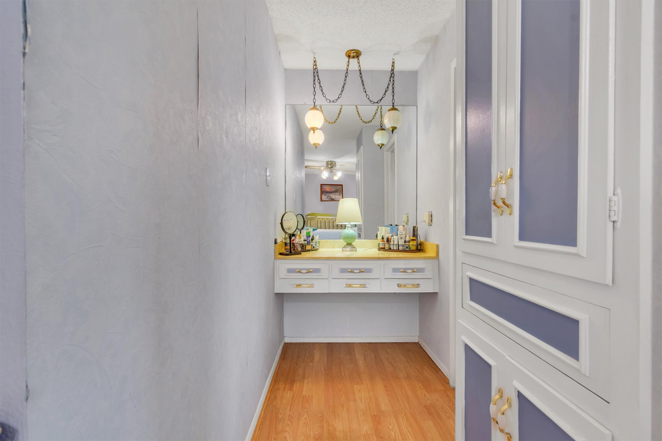 3100 Blue Ridge Drive Cedar Park, TX 78613 - Photo 14 of 34 a bathroom with a sink mirror and vanity