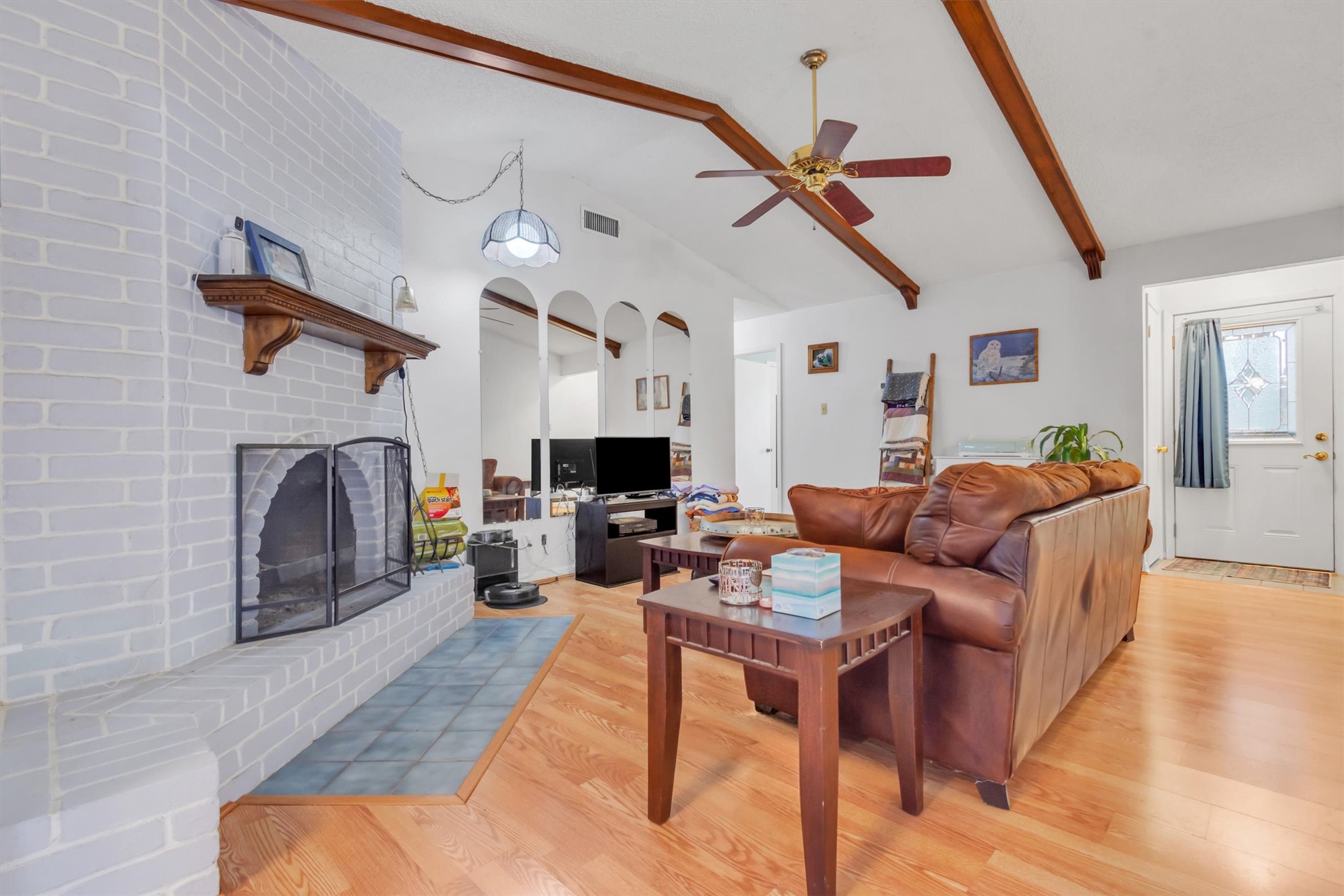 3100 Blue Ridge Drive Cedar Park, TX 78613 - Photo 18 of 34 a living room with furniture and a fireplace