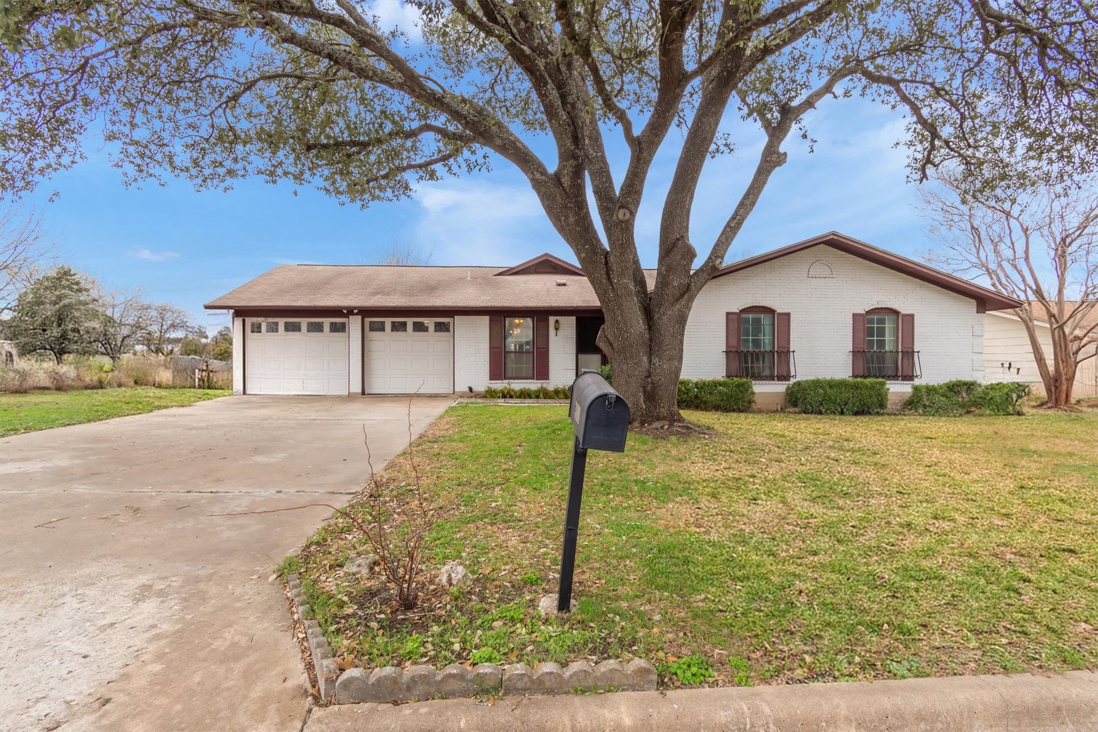 3100 Blue Ridge Drive Cedar Park, TX 78613 - Photo 2 of 34 a front view of a house with garden