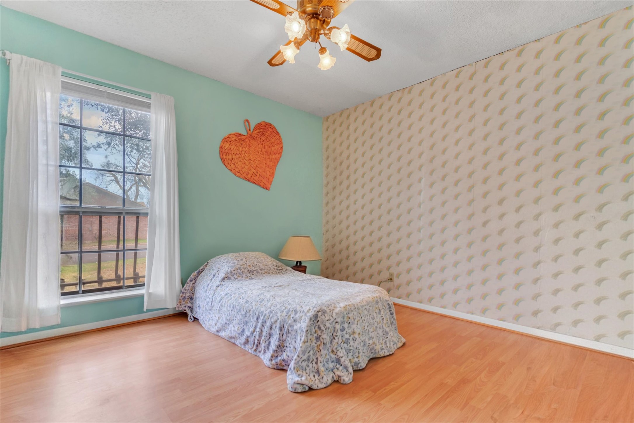 3100 Blue Ridge Drive Cedar Park, TX 78613 - Photo 4 of 34 a bedroom with a bed and a window