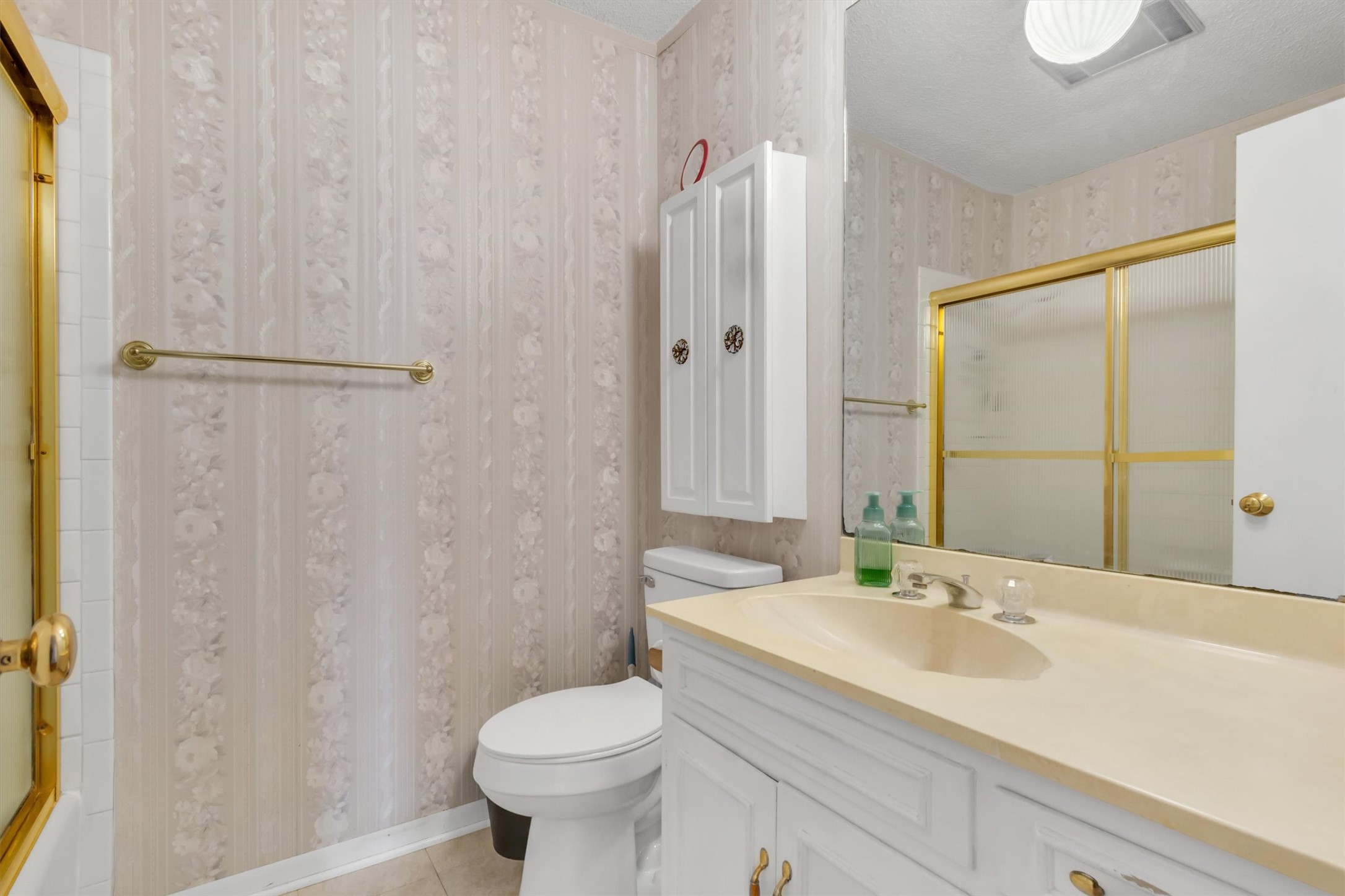 3100 Blue Ridge Drive Cedar Park, TX 78613 - Photo 8 of 34 a bathroom with a sink a toilet and shower