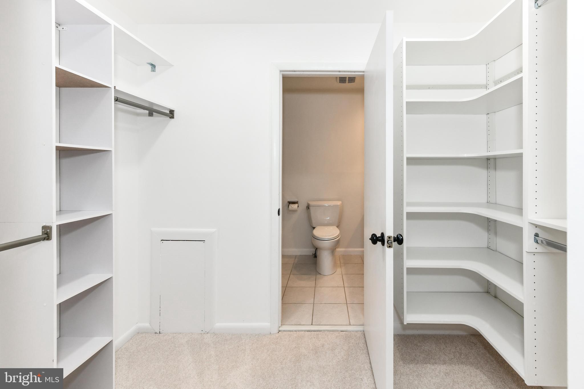 11701 Newbridge Court Reston, VA 20191 - Photo 25 of 64 Second large closet with custom organizers