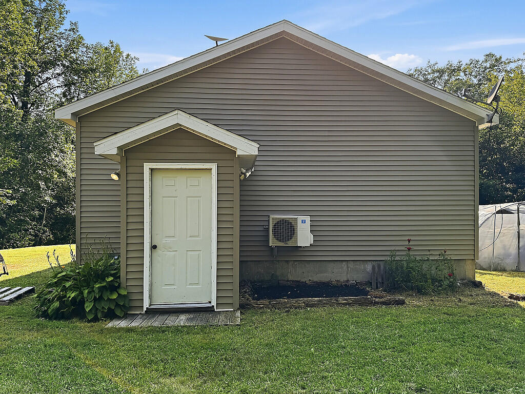 180 Perkins Road Burnham, ME 04922 - Photo 22 of 29 Exterior basement entry