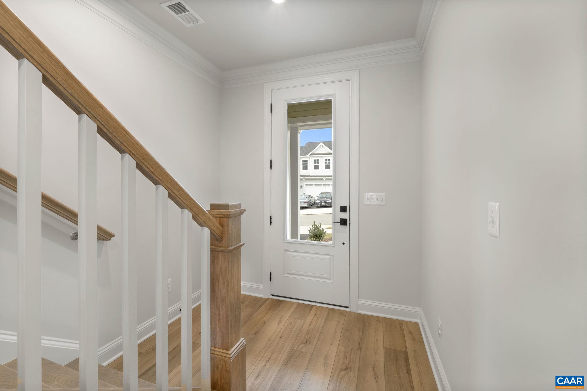 47 Marcella Street Charlottesville, VA 22911 - Photo 4 of 48 a view of entryway with wooden floor and stairs