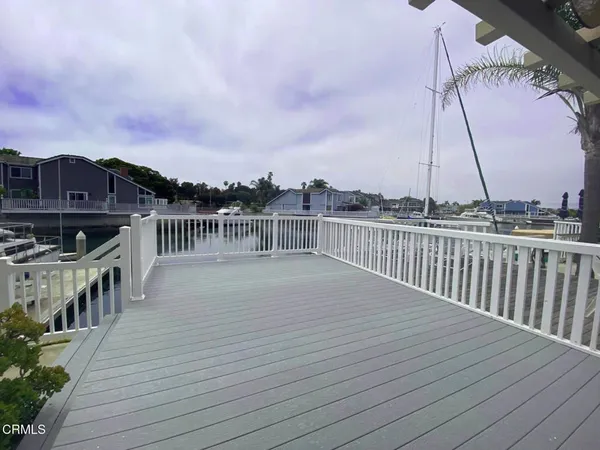 a view of a roof with wooden floor
