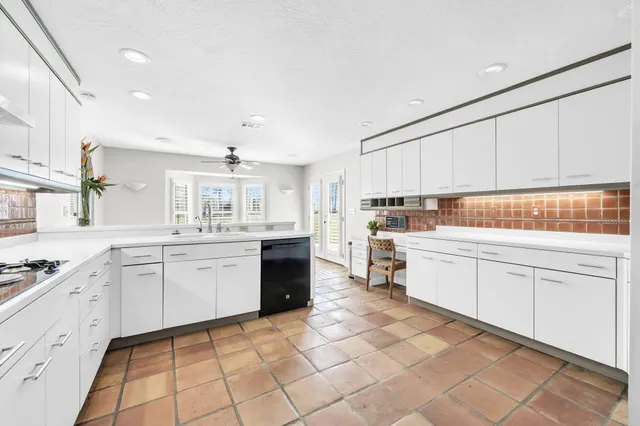 a workspace with furniture and window