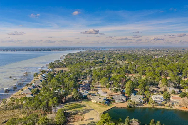 a view of a swimming pool with an outdoor space and seating area