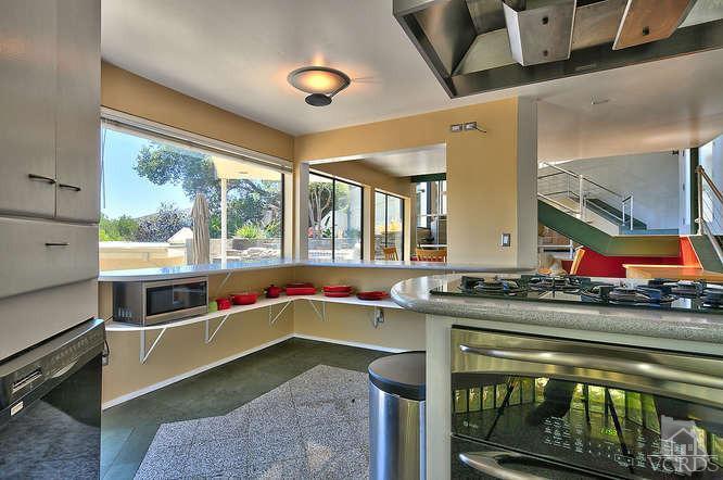 5940 Hilltop Road Simi Valley, CA 93063 - Photo 11 of 34 a kitchen with a stove and a sink