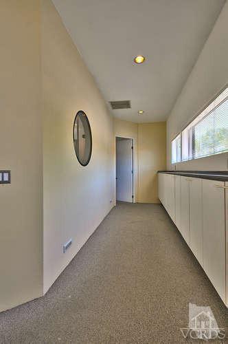 5940 Hilltop Road Simi Valley, CA 93063 - Photo 20 of 34 a view of an empty room with a window