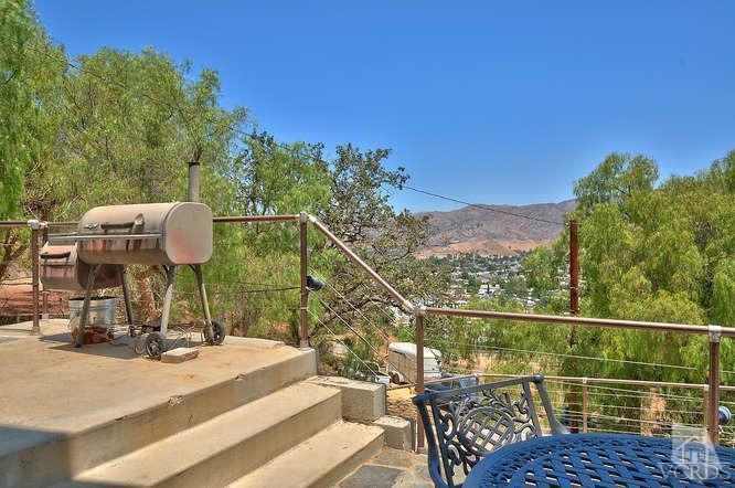 5940 Hilltop Road Simi Valley, CA 93063 - Photo 32 of 34 a view of a balcony with chairs