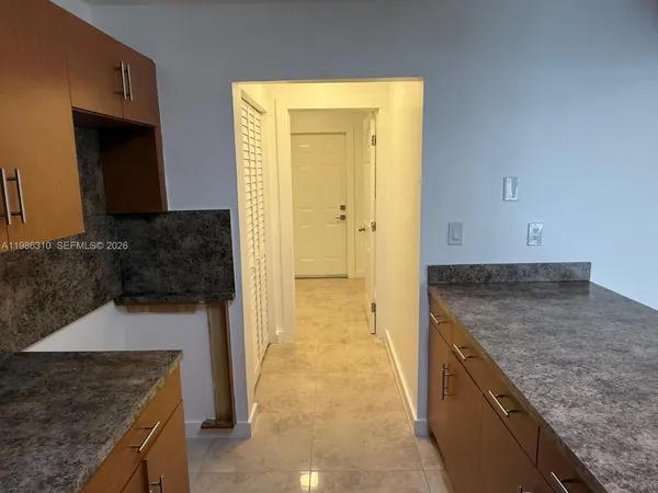 a view of a kitchen cabinets