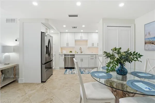 a view of a dining room with furniture