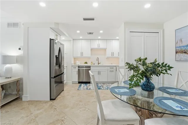 a view of a dining room with furniture