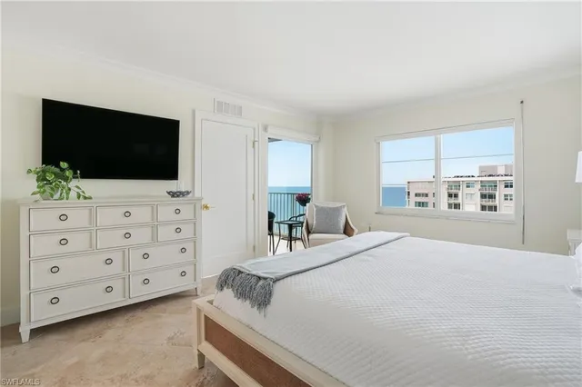 a bathroom with a double vanity sink mirror and shower