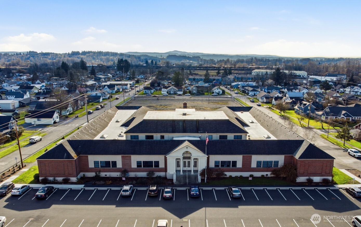 a aerial view of a house with a swimming pool
