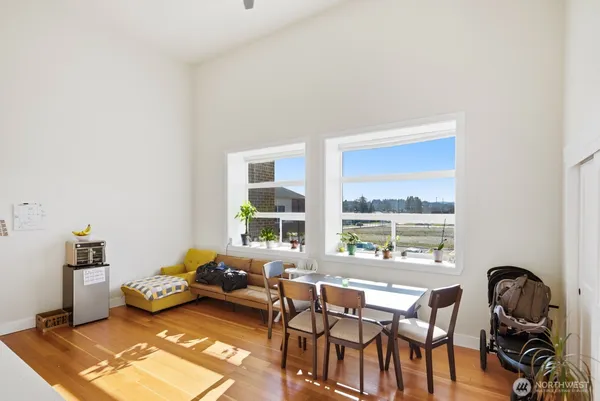 a bedroom with furniture and a window