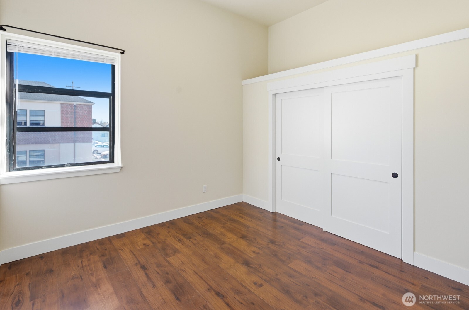 101 Southwest 2nd Street Chehalis, WA 98532 - Photo 16 of 21 a view of an empty room with wooden floor and a window