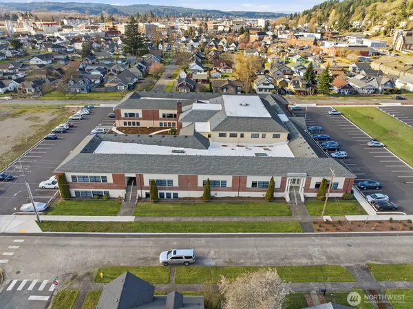 an aerial view of a house with a ocean view