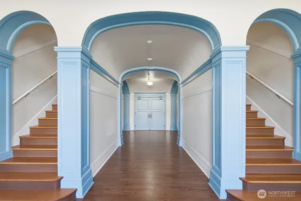 a view of entryway with wooden floor