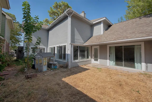 a house with a large garden space