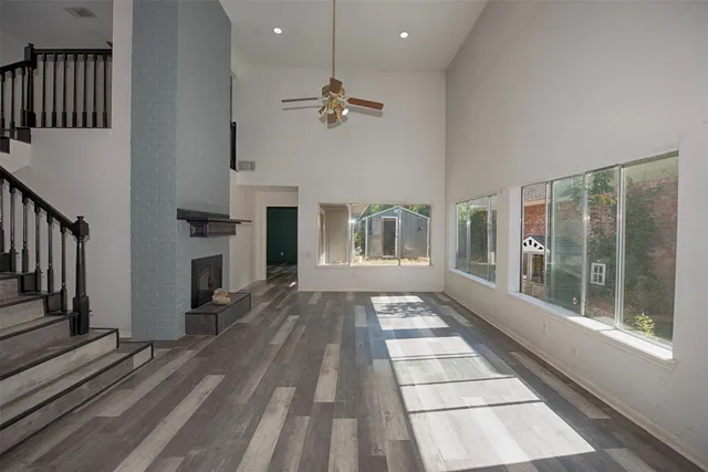 a view interior of the house with wooden floor and fireplace