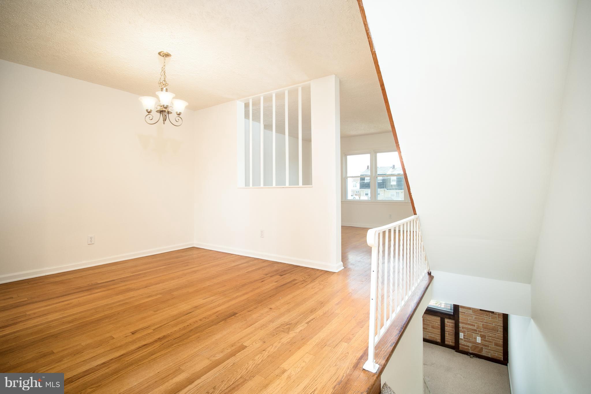 3639 Clarenell Road Baltimore, MD 21229 - Photo 6 of 24 Dining Room with stairs to basement.