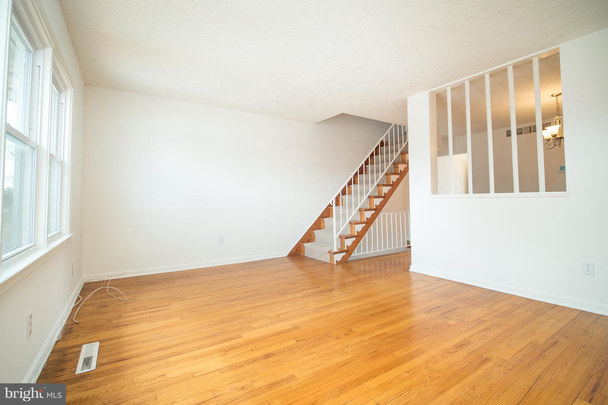 3639 Clarenell Road Baltimore, MD 21229 - Photo 8 of 24 Family Room with steps to upstairs.