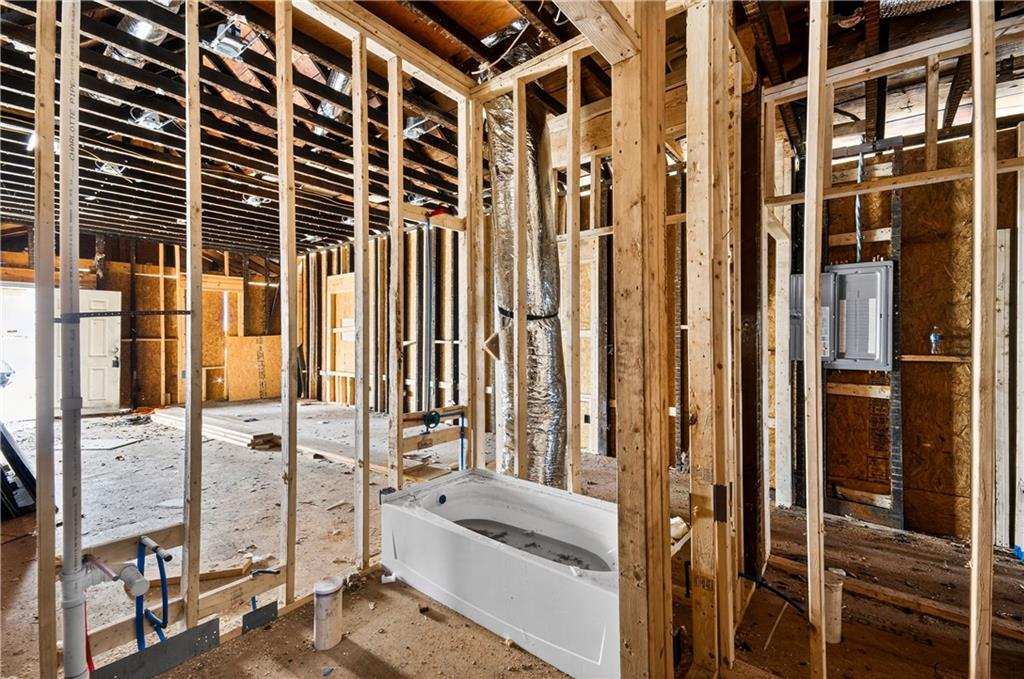 913 Smith Street Southwest Atlanta, GA 30310 - Photo 18 of 43 a bathroom with a bathtub and shower