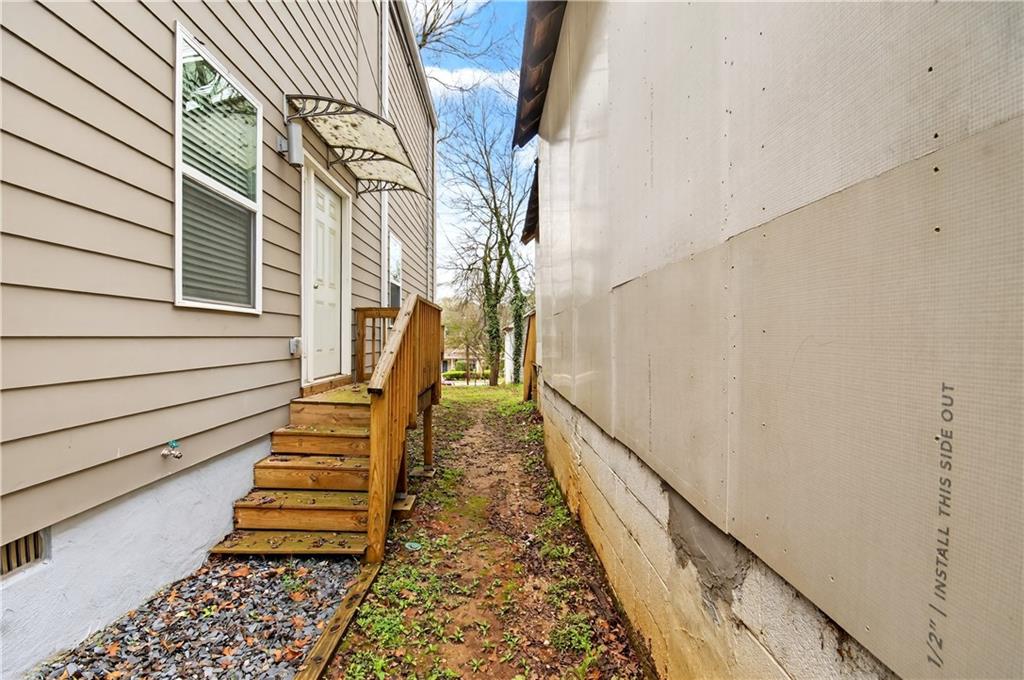 913 Smith Street Southwest Atlanta, GA 30310 - Photo 25 of 43 a view of stairs with wooden floor