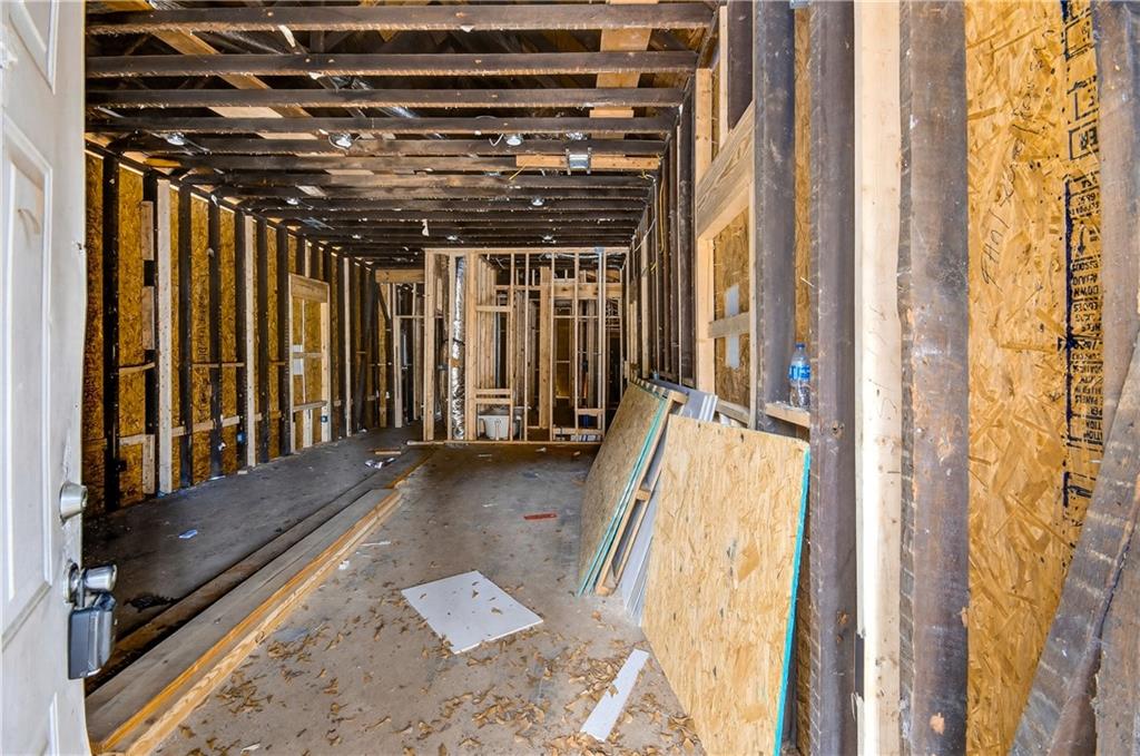 913 Smith Street Southwest Atlanta, GA 30310 - Photo 8 of 43 a view of a hallway with wooden floor