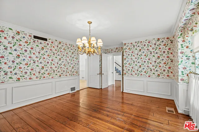 a view of a livingroom with wooden floor