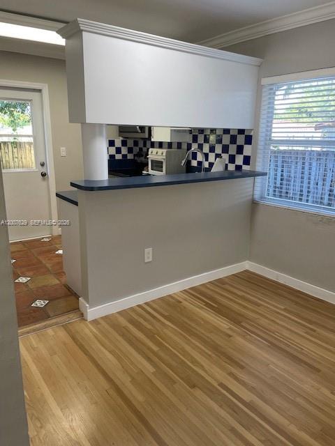 5886 Southwest 42nd Street Miami, FL 33155 - Photo 6 of 20 a view of wooden floor and windows in a room