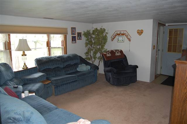 5763 West Richland Road Freeport, IL 61032 - Photo 3 of 9 a living room with furniture and a large window