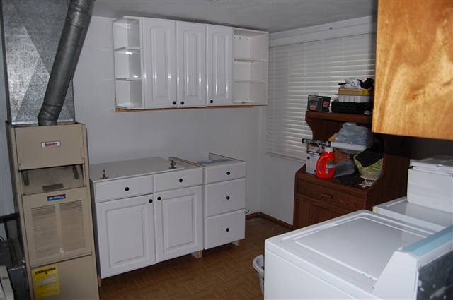 5763 West Richland Road Freeport, IL 61032 - Photo 4 of 9 a utility room with dryer and washer