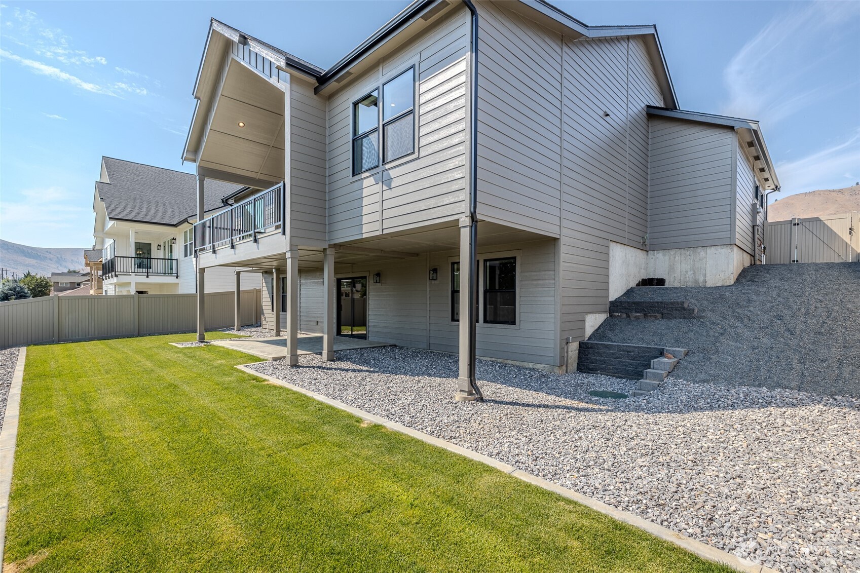 958 Racine Spgs Drive Wenatchee, WA 98801 - Photo 23 of 25 a view of a house with backyard and porch