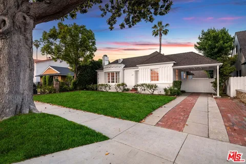 a front view of house with yard