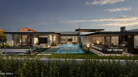 a view of a house with backyard sitting area and garden