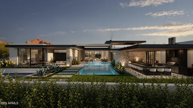 a view of a house with backyard sitting area and garden