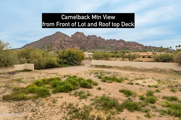 a view of a road with a building in the background