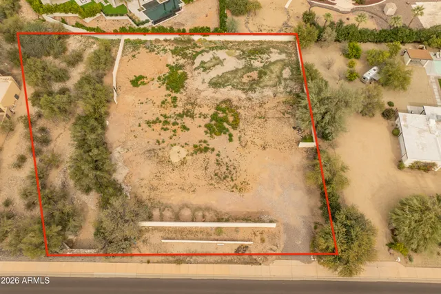 a view of residential houses with ocean view