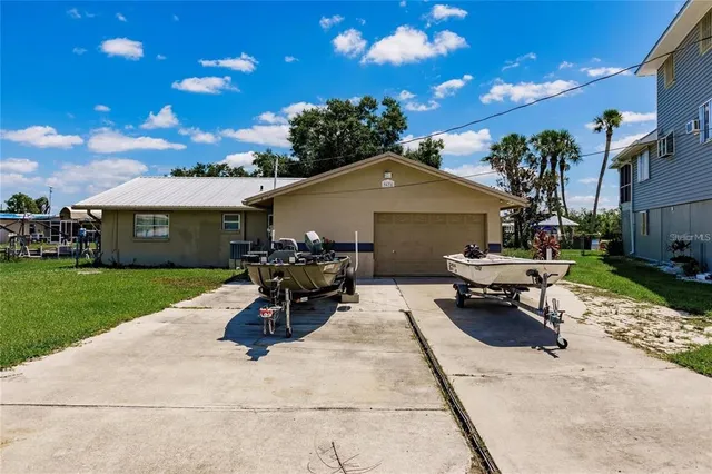 a view of a house with patio porch and sitting area