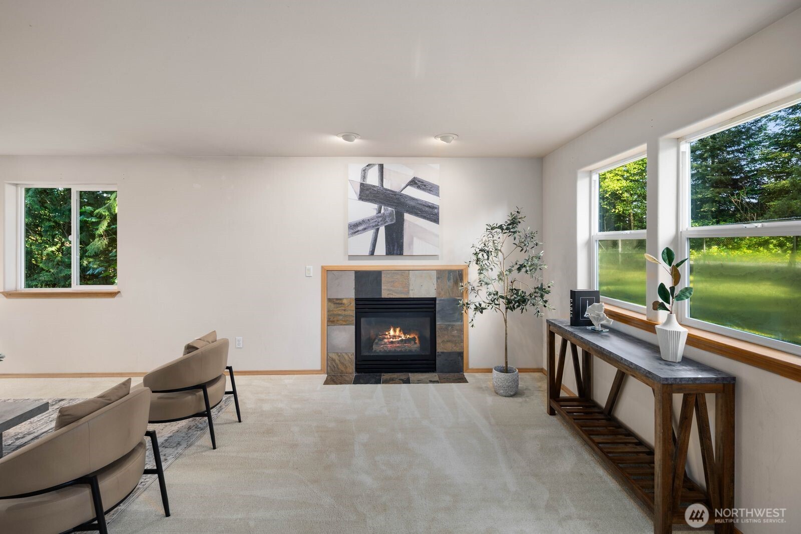 22217 Old Owen Road Monroe, WA 98272 - Photo 12 of 34 a living room with furniture and a fireplace