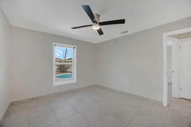 a kitchen with a stove and a microwave