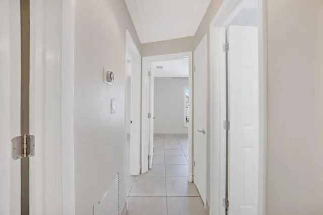 an aerial view of multiple houses with yard