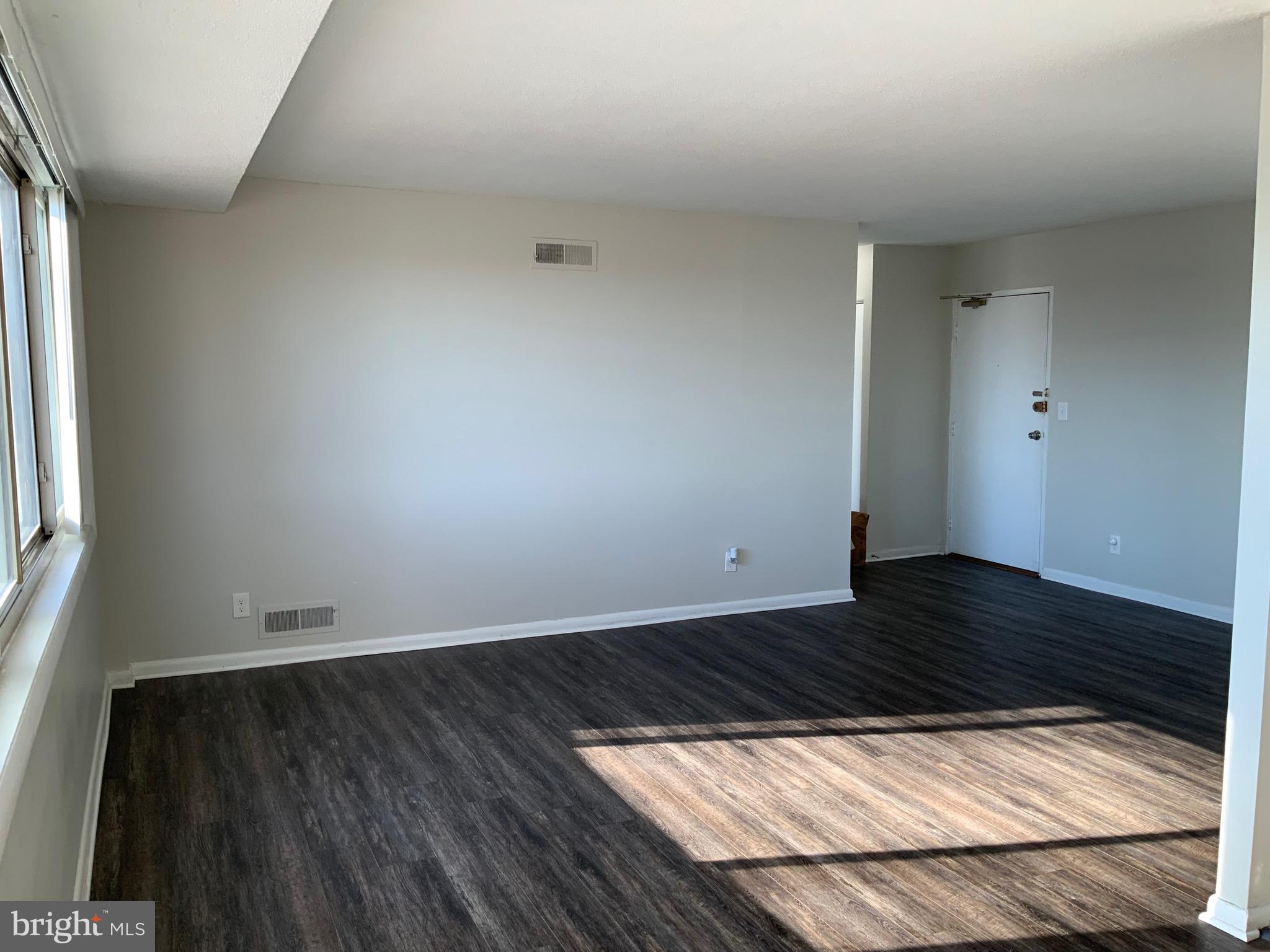 4410 Oglethorpe Street, Unit 201 Hyattsville, MD 20781 - Photo 4 of 13 a view of wooden floor