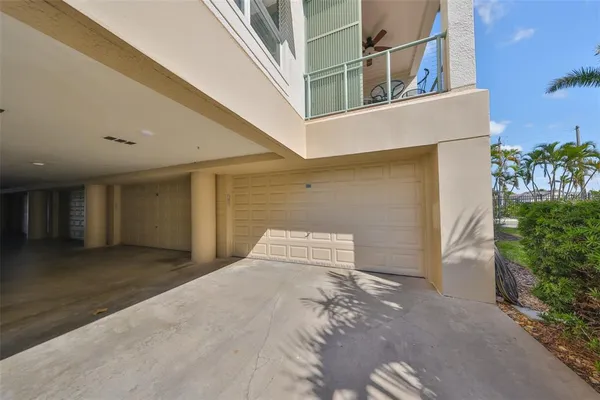 a view of swimming pool with outdoor seating and plants