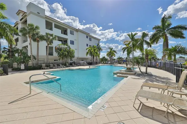 a view of a chairs and table in a patio