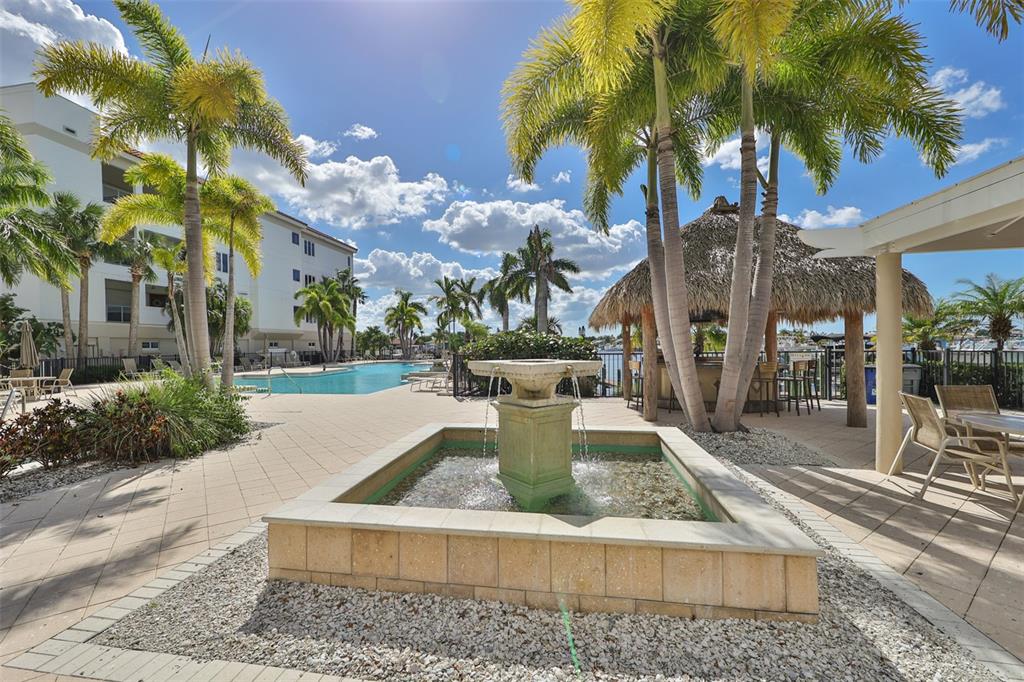 1030 Bellasol Way, Unit 302 Apollo Beach, FL 33572 - Photo 37 of 39 a view of a house with a swimming pool