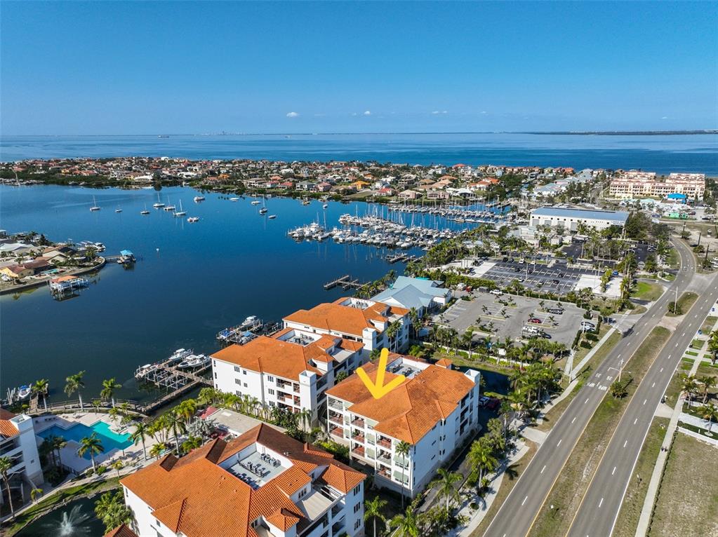 1030 Bellasol Way, Unit 302 Apollo Beach, FL 33572 - Photo 39 of 39 an aerial view of residential building and lake
